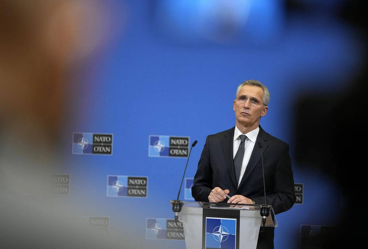 NATO Secretary General Jens Stoltenberg listens to questions during a media conference at NATO headquarters in Brussels, Thursday, Feb 24, 2022. NATO envoys met in emergency session Thursday after Russian President Vladimir Putin ordered a large-scale attack on Ukraine as the 30-nation military organization prepares to bolster its defenses in allies neighboring both countries. (AP Photo/Virginia Mayo)