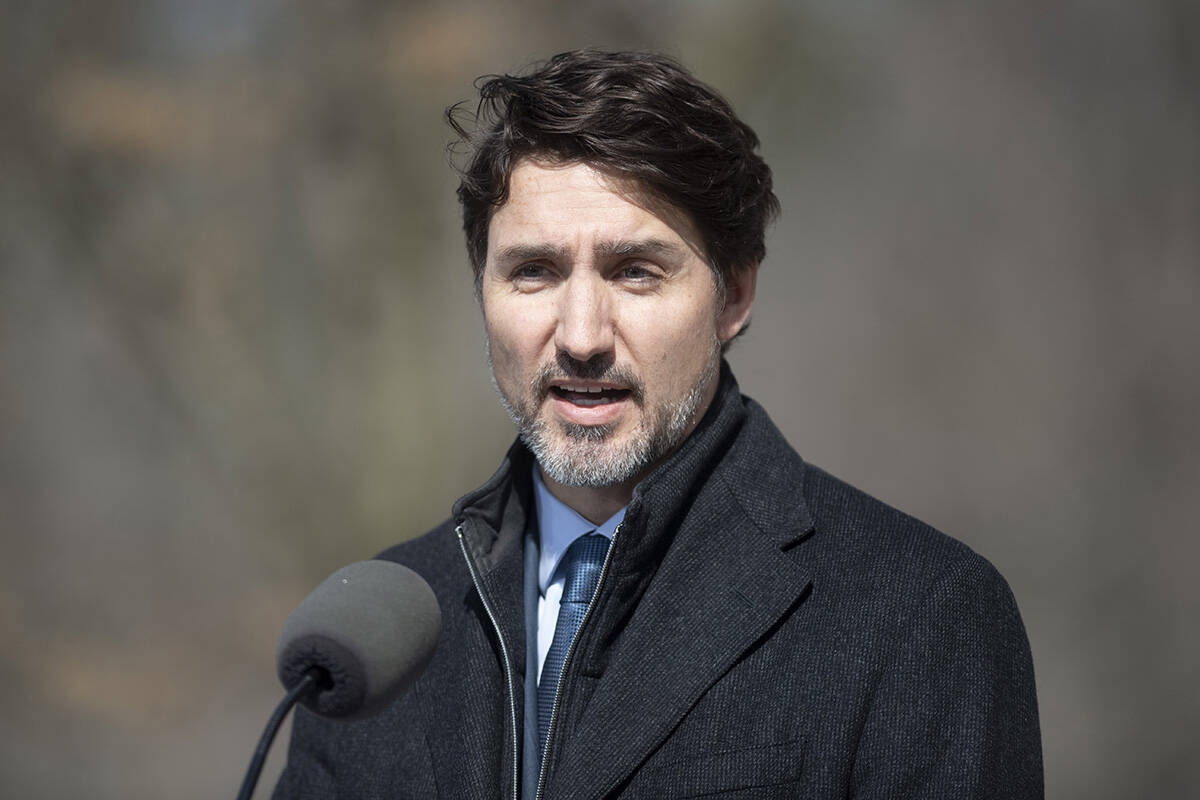 Prime Minister Justin Trudeau speaks to the media. THE CANADIAN PRESS/Adrian Wyld