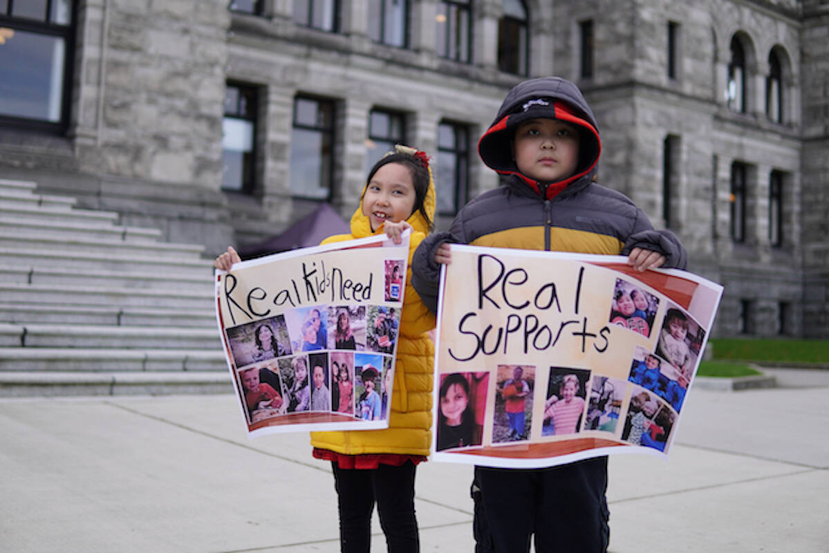 Children protest in front of BC Parliament for autism support in B.C. in 2021. (Autism BC)