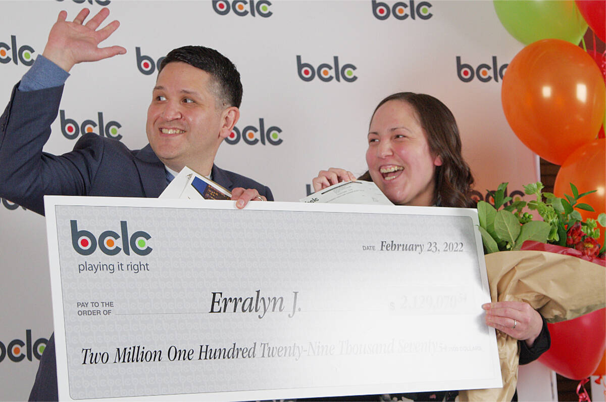 Joshua and Erralyn Joseph celebrate during a prize presentation ceremony at Casino Nanaimo on Thursday, March 3, when they were handed a cheque for more than $2.1 million after Erralyn hit the jackpot on one of the casino’s slot machines. (Chris Bush/News Bulletin)