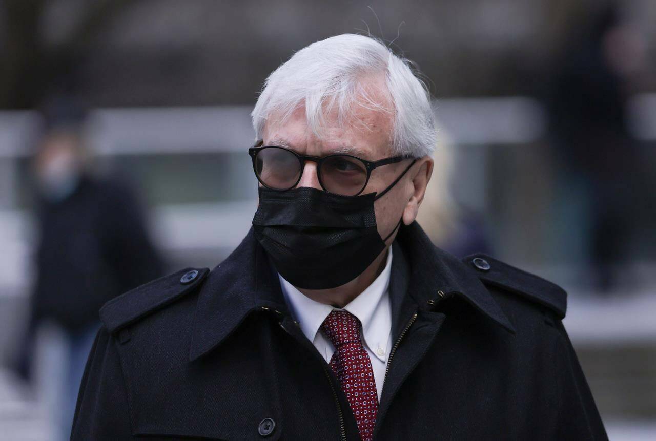 Craig James, former clerk of the British Columbia legislature, leaves B.C. Supreme Court on Jan. 26, 2022. Former Speaker of the legislature, Bill Barisoff is testifying at the trial of James, who has pleaded not guilty to two counts of fraud over $5,000 and three counts of breach of trust by a public officer in relation to allegations that he used his position for personal gain. THE CANADIAN PRESS/Darryl Dyck