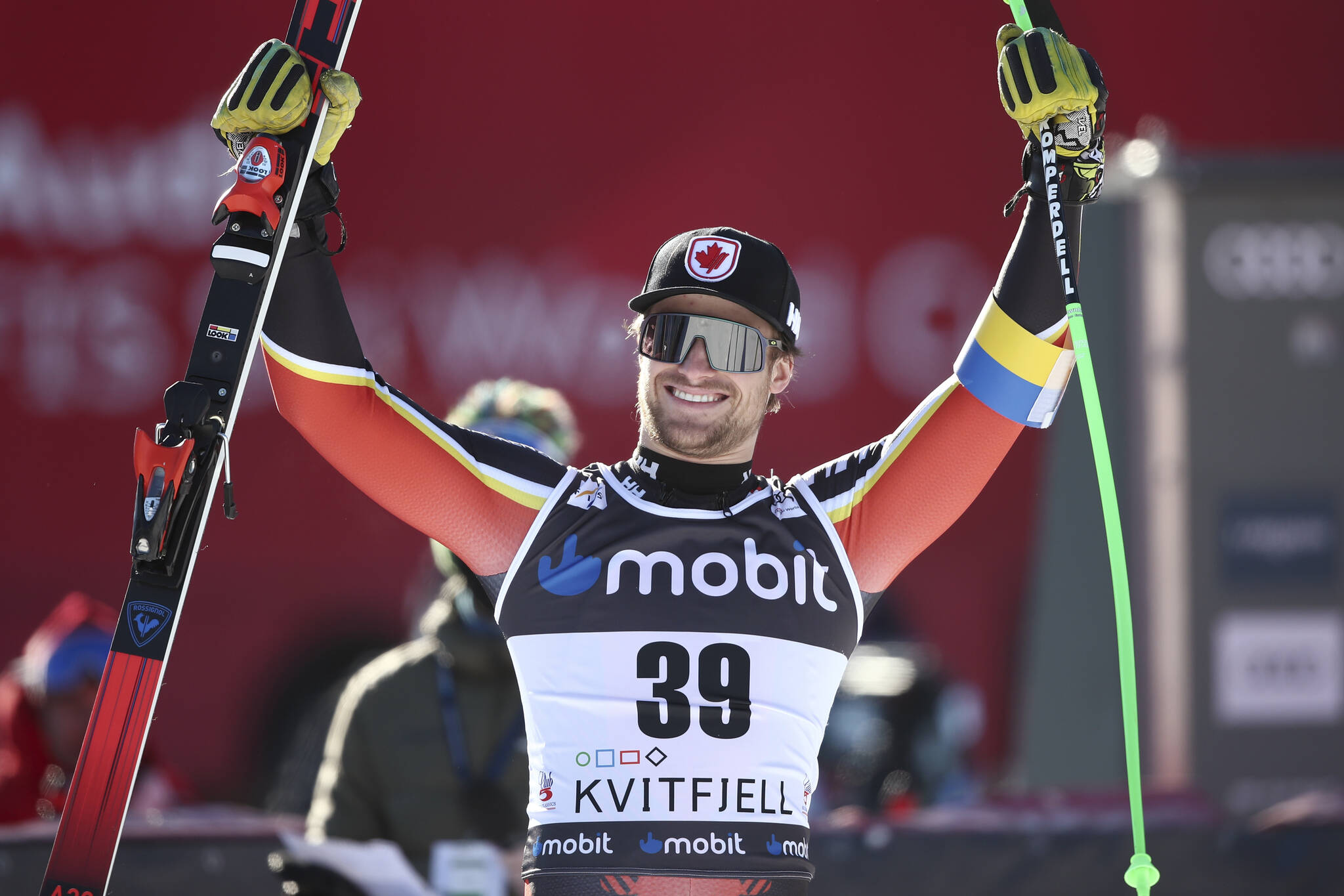 Canada’s Cameron Alexander celebrates after winning with Switzerland’s Niels Hintermann with equal time of an alpine ski, World Cup men’s downhill, in Kvitfjell, Norway, Friday, March 4, 2022. (AP Photo/Gabriele Facciotti)