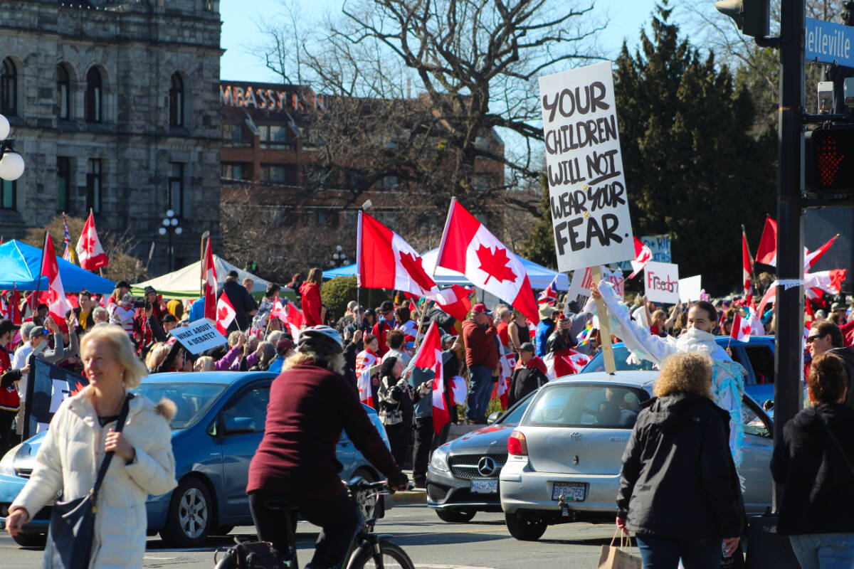 Thousands gathered on the grounds of the B.C. Legislature for another rally on March 5 opposing pandemic-related mandates. (Megan Atkins-Baker/News Staff)