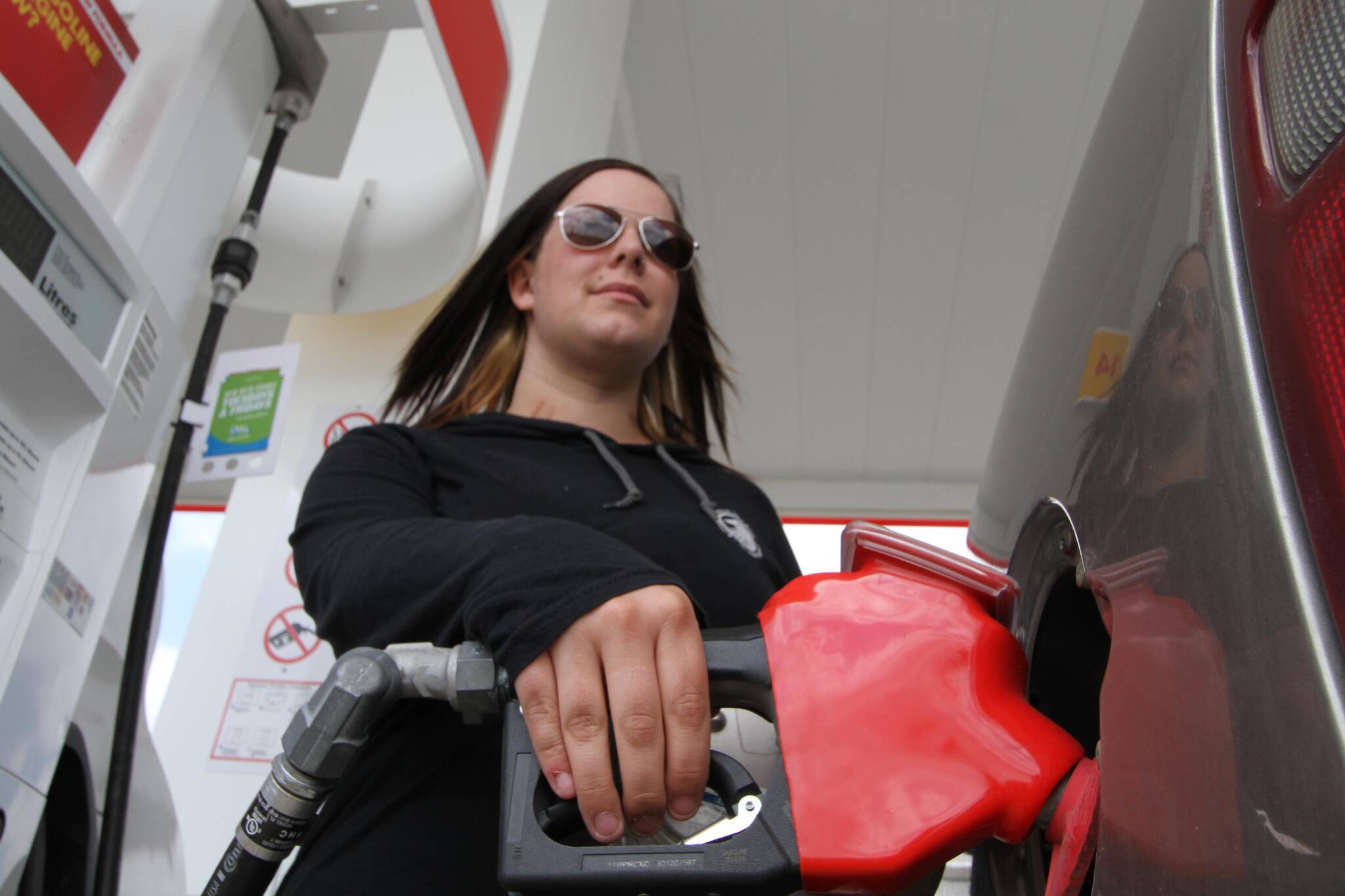 Samantha Masyk gases up in Alberta, where the provincial government is cutting gas taxes to offset rising prices at the pump. PAUL COWLEY/Advocate staff
Samantha Masyk gases up in Alberta, where the provincial government is cutting gas taxes to offset rising prices at the pump. PAUL COWLEY/Advocate staff