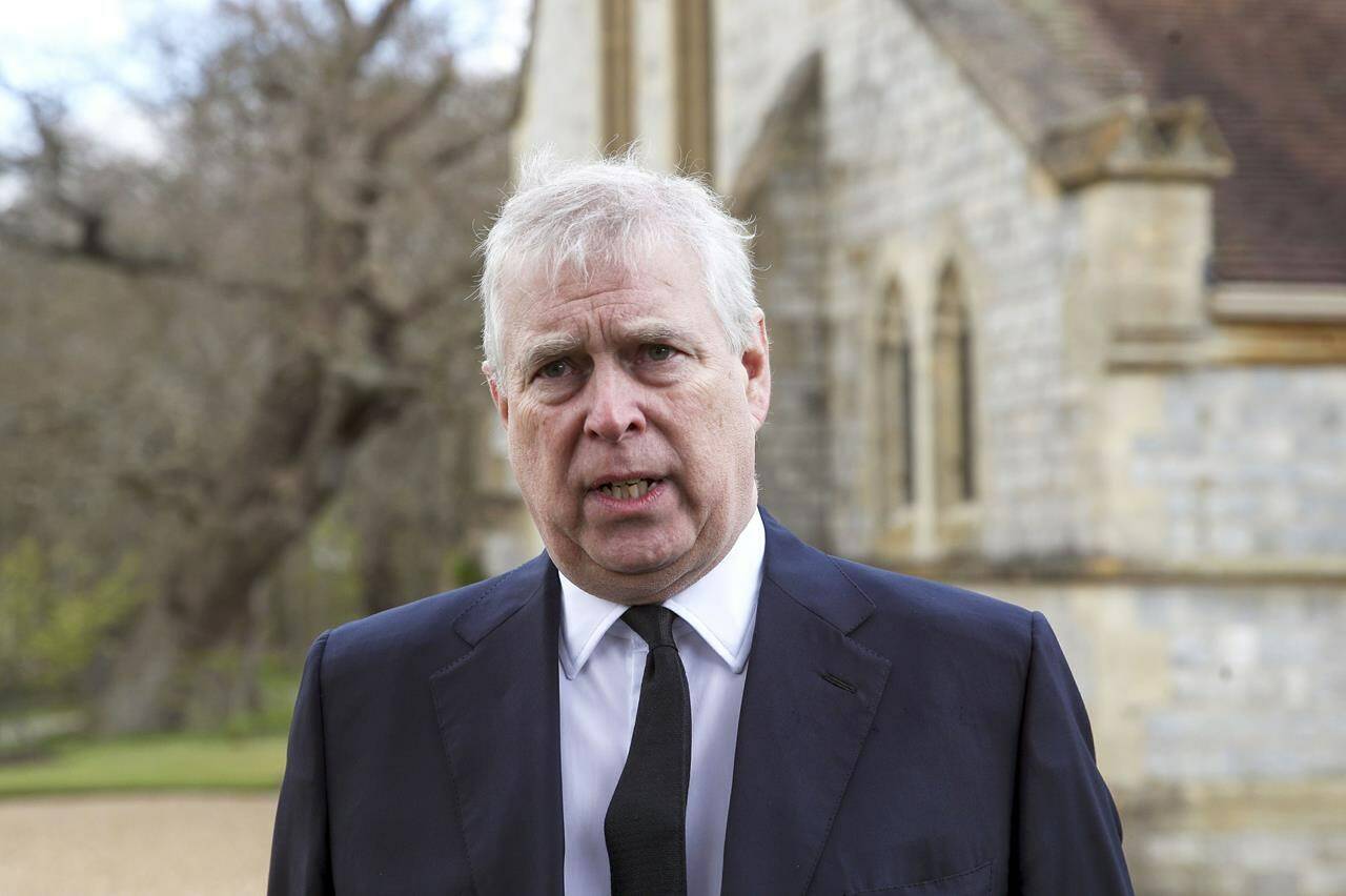 FILE - Britain’s Prince Andrew speaks during a television interview at the Royal Chapel of All Saints at Royal Lodge, Windsor, April 11, 2021. Lawyers for Prince Andrew and Virginia Giuffre, who accused him of sexually abusing her when she was 17, formally asked a judge Tuesday to dismiss her lawsuit. (Steve Parsons/Pool Photo via AP, File)