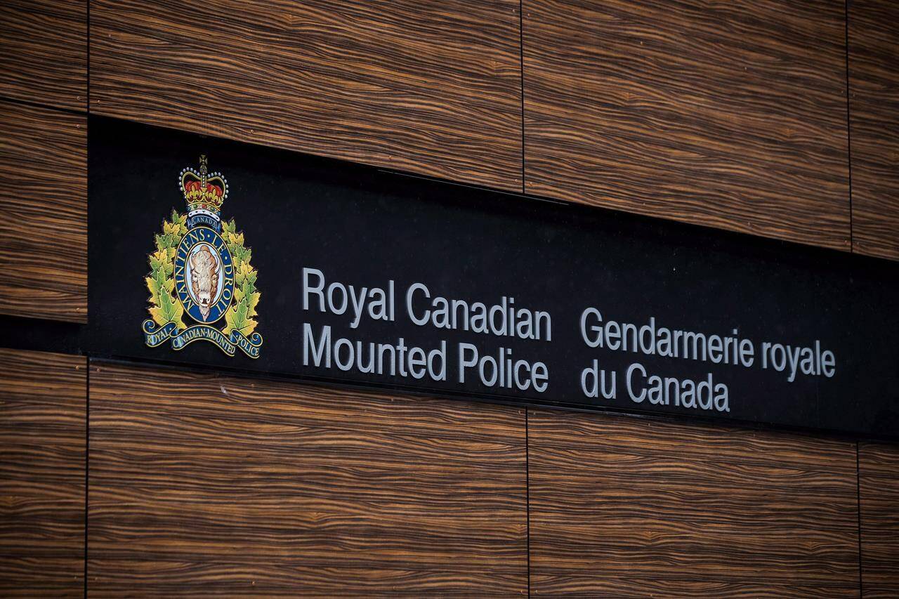 RCMP in northern Alberta say one of their officers is facing a criminal charge related to a crash that happened while she was on duty. The RCMP logo is seen outside Royal Canadian Mounted Police “E” Division Headquarters, in Surrey, B.C., on Friday April 13, 2018. THE CANADIAN PRESS/Darryl Dyck