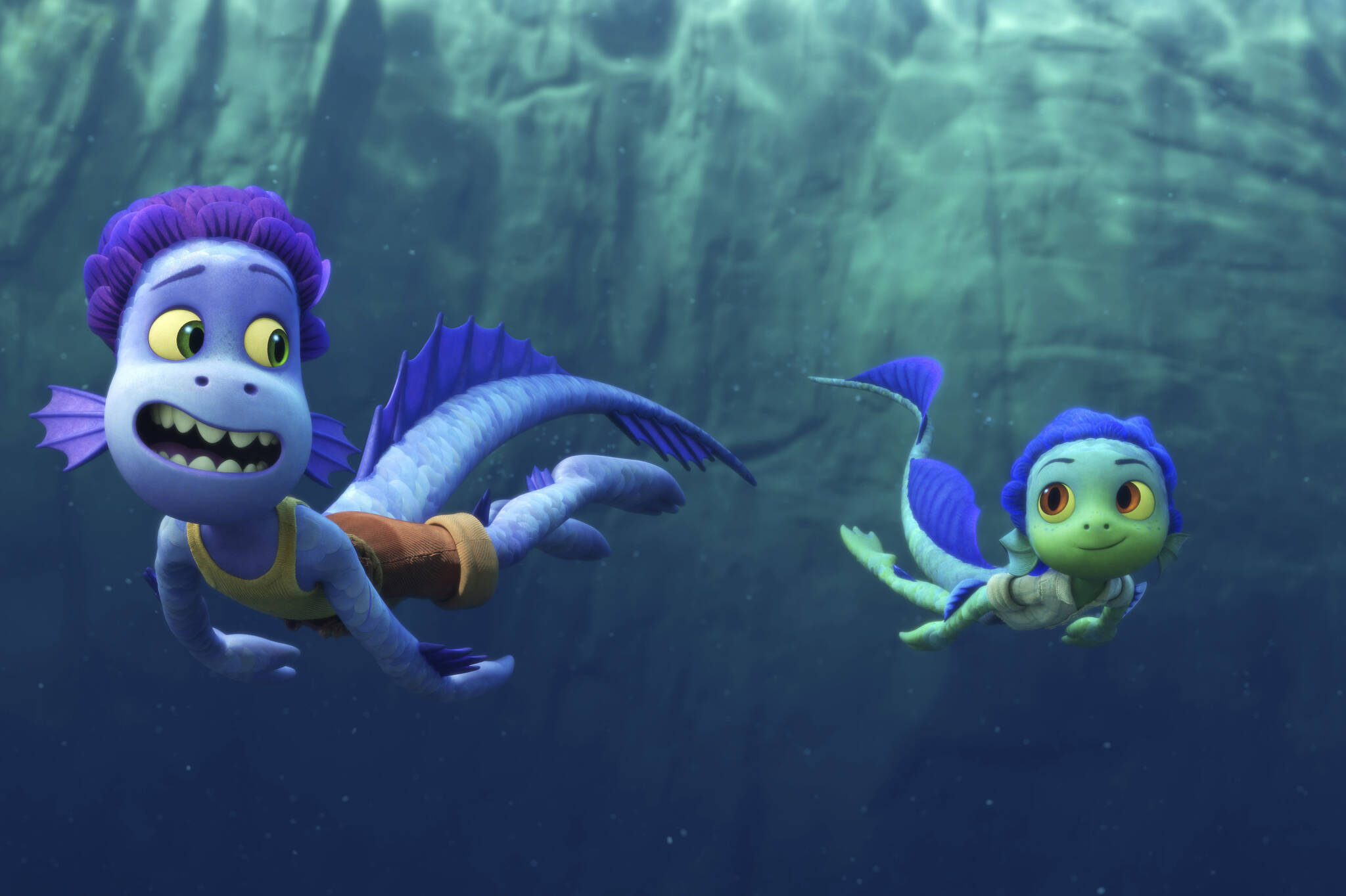 The Pixar film “Luca” on Disney+ was the most watched movie of 2021 according to Nielsen. This image released by Disney shows characters Alberto, voiced by Jack Dylan Grazer, left, and Luca, voiced by Jacob Tremblay in a scene from the animated film. (Disney via AP)