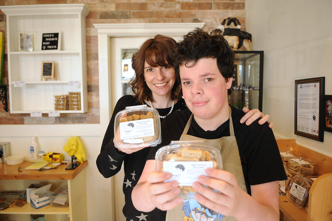 Ryder Newhouse, seen here with his mom Nicole at Fergie’s Doggie Delight Pet Bakery in Chilliwack on March 5, 2022, is making and selling dog treats to raise money for BC and Alberta Guide Dogs. (Jenna Hauck/ Chilliwack Progress)