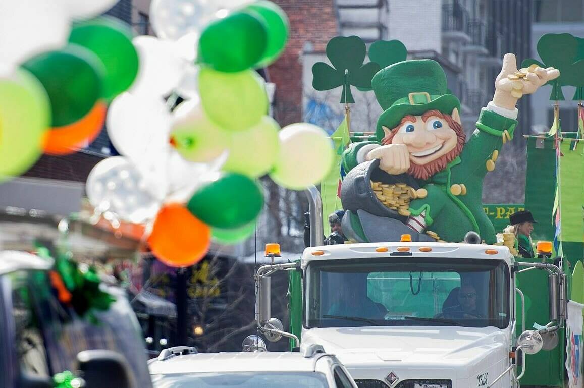 A colourful float makes its way down Ste. Catherine St. during the annual St. Patrick’s Day parade in Montreal, Sunday, March 22, 2015. THE CANADIAN PRESS/Graham Hughes