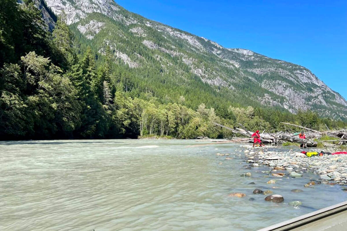 Searchers look for missing boaters on the Bella Coola River August 2021. (Bella Coola Valley Search and Rescue photo)