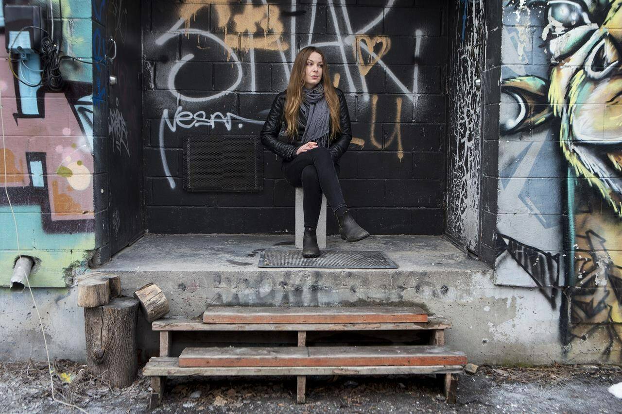 Sonja Mally is photographed near her home in Toronto, on Monday, March 14, 2022. The artist has been barely able to leave her home since developing long COVIID. THE CANADIAN PRESS/Chris Young