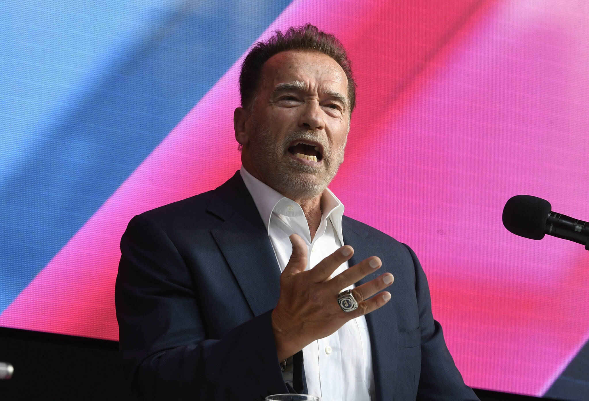 Arnold Schwarzenegger talks about Digital Sustainability during the Digital X conference in Cologne, Germany, Tuesday, Sept. 7, 2021. (Roberto Pfeil/dpa via AP)