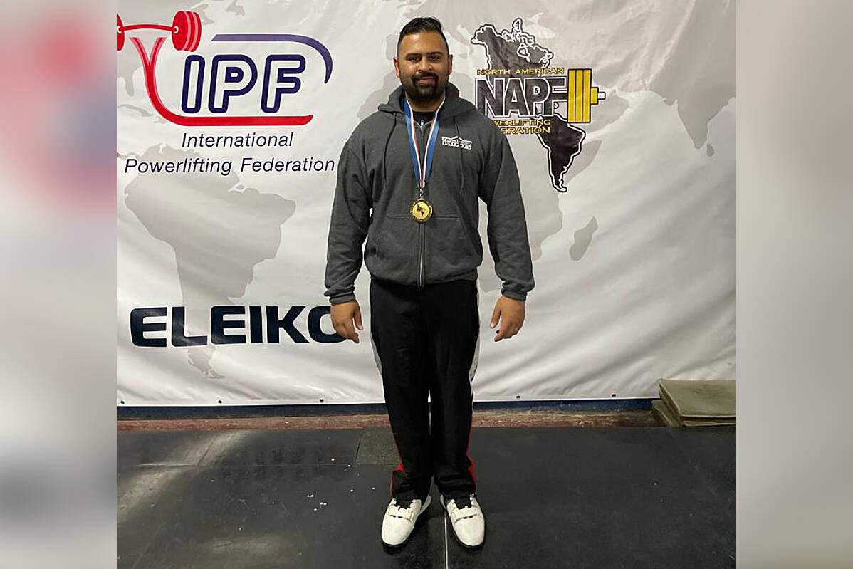Powerlifter Sumeet Sharma wears the gold medal he won for bench press at the North American Powerlifting Championships in San Jose, Costa Rica, last fall. Sharma has started a new fundraising initiative in support of Ukraine. (Photo submitted: Sumeet Sharma)