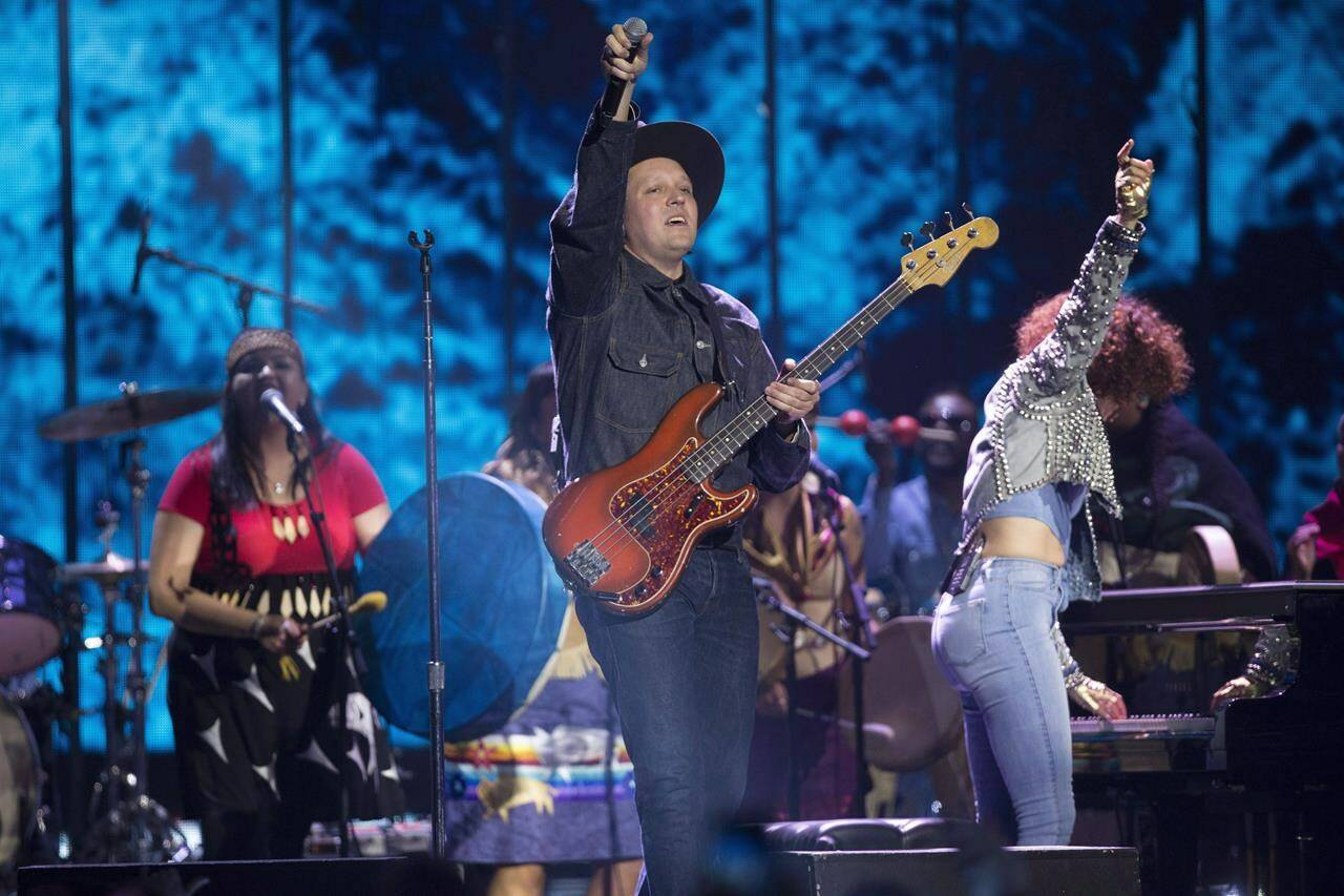 Arcade Fire performs at the Juno Awards in Vancouver, Sunday, March, 25, 2018. The Montreal rock band Arcade Fire is set to perform at the Juno Awards in May. It will be the group’s first time back on the Juno stage since its performance at the 2018 awards. THE CANADIAN PRESS/Darryl Dyck