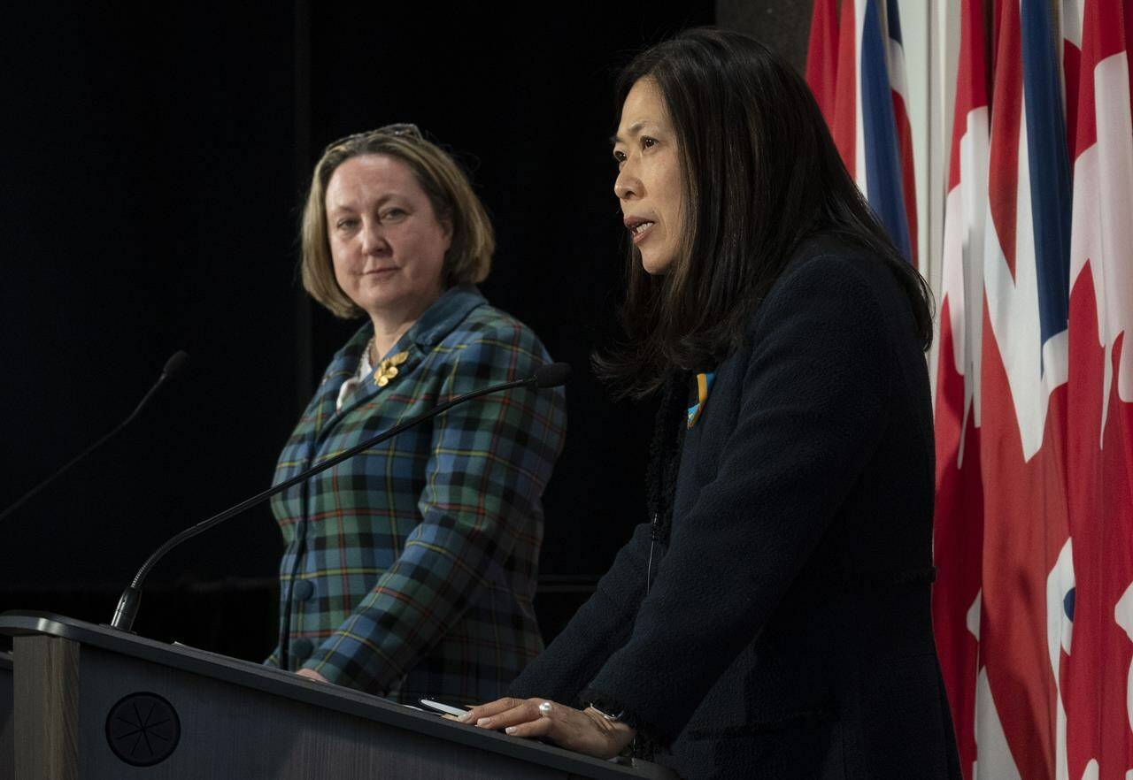 Minister of Economic Development, Minister of International Trade and Minister of Small Business and Export Promotion Mary Ng speaks as the United Kingdom’s Secretary of State for International Trade Anne-Marie Trevelyan looks on during a joint news conference on Thursday, March 24, 2022 in Ottawa. THE CANADIAN PRESS/Adrian Wyld