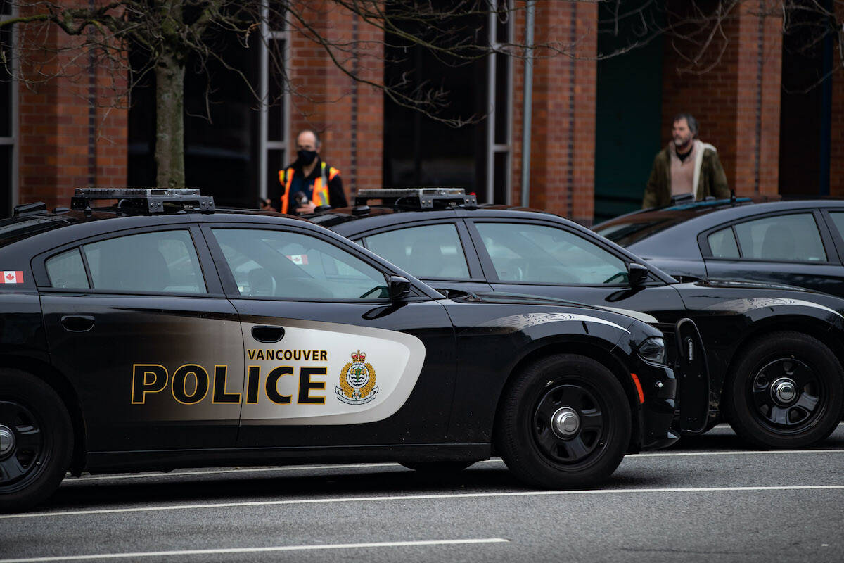 Random assaults in Vancouver amounted to four per day between Sept. 1, 2020 and Aug. 31, 2021. Police cars are seen parked outside Vancouver Police Department headquarters in Vancouver, on Saturday, January 9, 2021. THE CANADIAN PRESS/Darryl Dyck