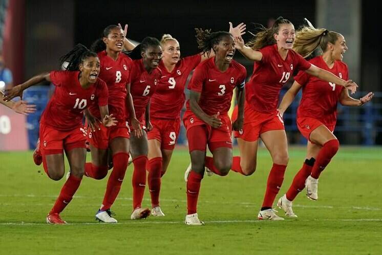 Canada players celebrate their win against Sweden during the women's soccer gold medal game at the Tokyo Olympics in Yokohama, Japan on Friday, August 6, 2021. Canada Soccer has announced the roster for a pair of women's friendly matchups against Nigeria set to take place in B.C. next month. THE CANADIAN PRESS/Adrian Wyld