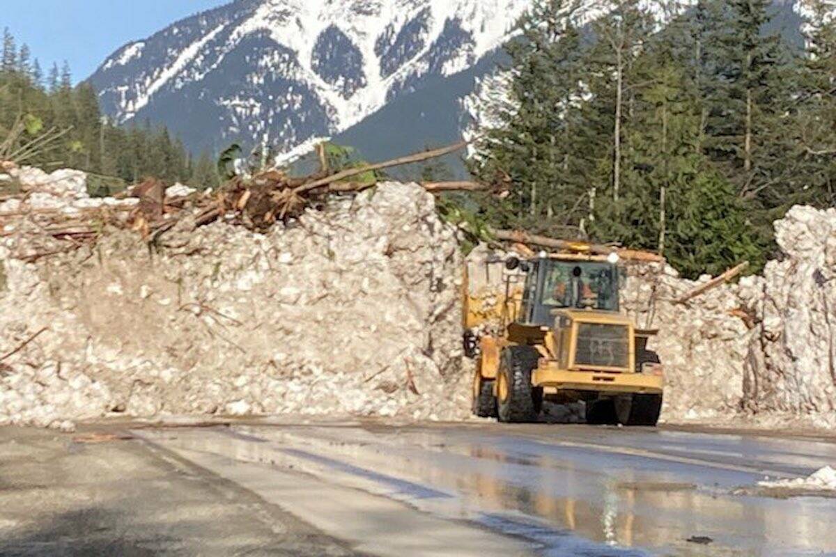 Crews clearing snow and debris off Highway 1 east of Revelstoke on March 29. (Rocky Mountain District twitter)