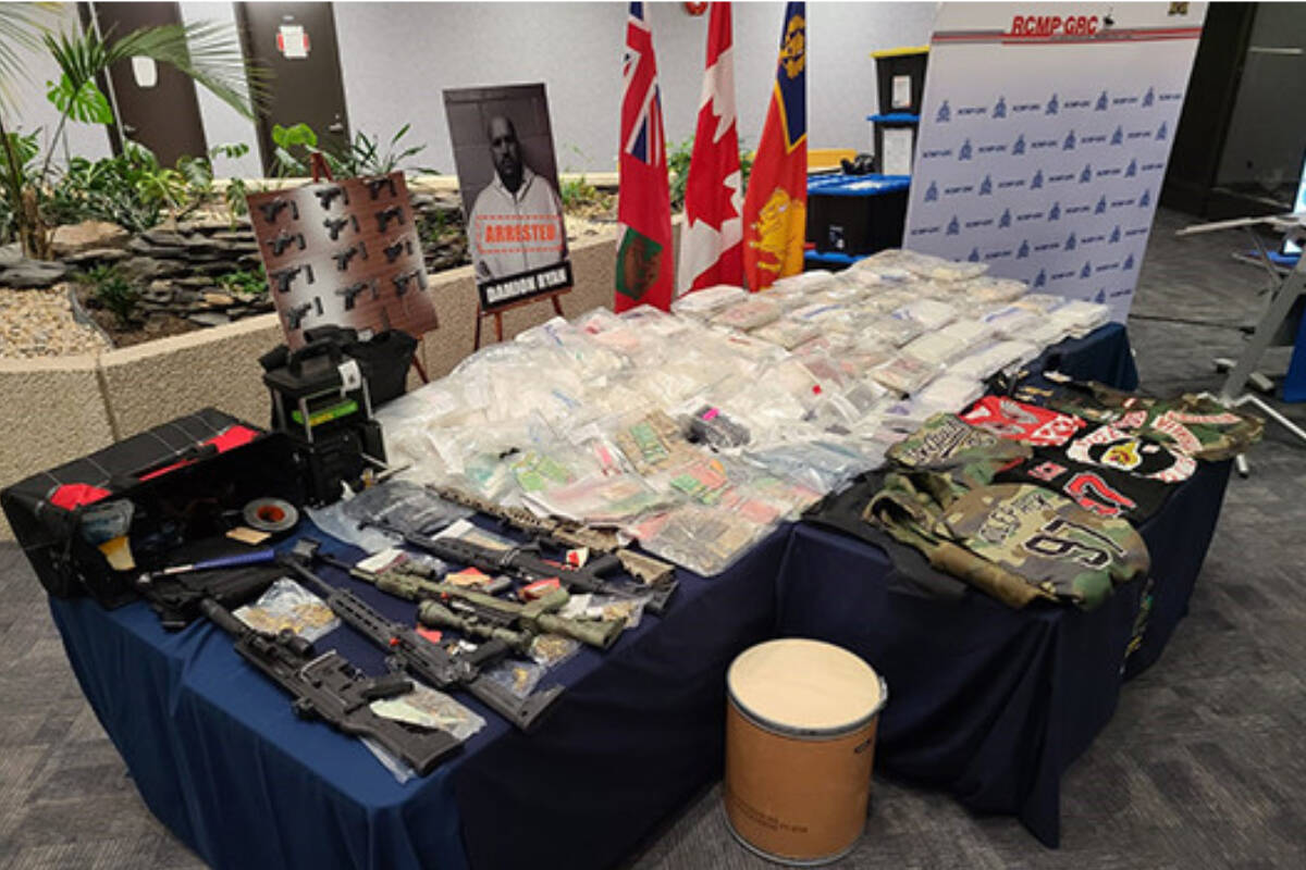 Officers seized 110kgs of cocaine, 41.4kgs of methamphetamine, three kilograms of fentanyl, a half a kilogram of MDMA, 14 handguns, five assault-style rifles and more than $445,000 in Canadian currency. (RCMP photo)