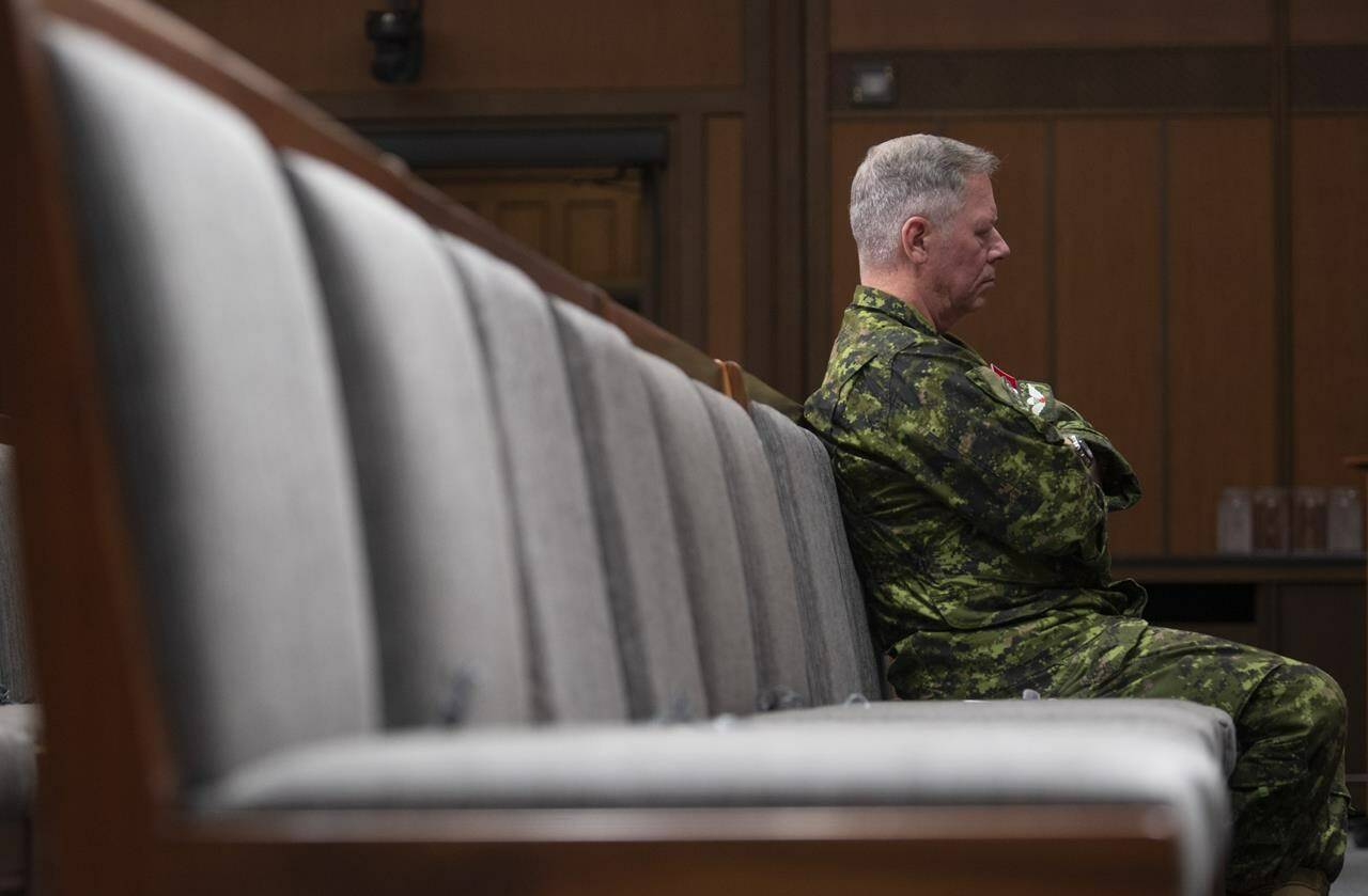 Chief of Defence Staff Jonathan Vance sits in the front row during a news conference Friday, June 26, 2020 in Ottawa. THE CANADIAN PRESS/Adrian Wyld