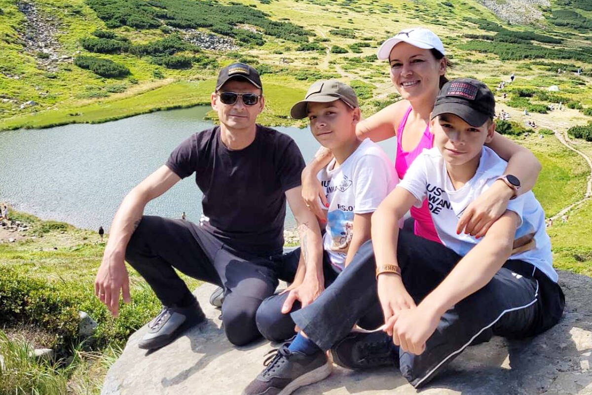 Viktoriia Serhiienko, her husband, Oleksandr, and their 13-year-old sons, Daniil and Illia. (Special to The News)