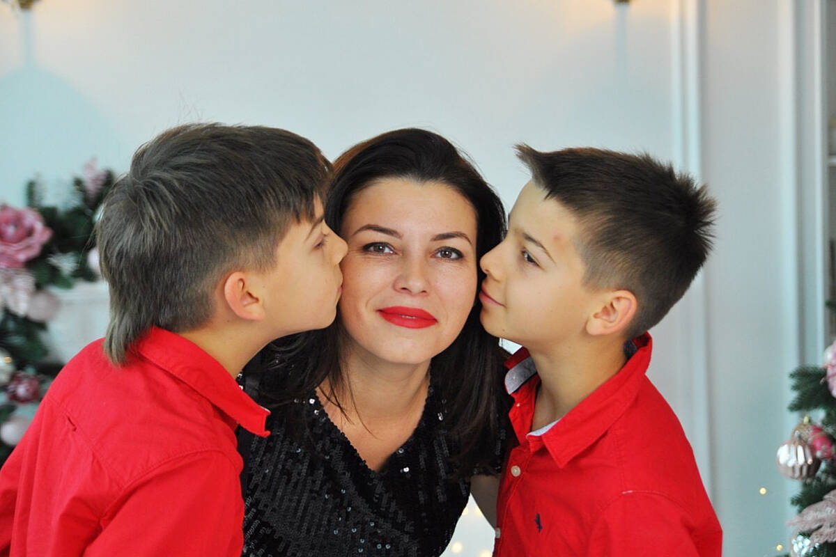 Viktoriia Serhiienko and her 13-year-old sons Daniil and Illia, (Special to The News)
