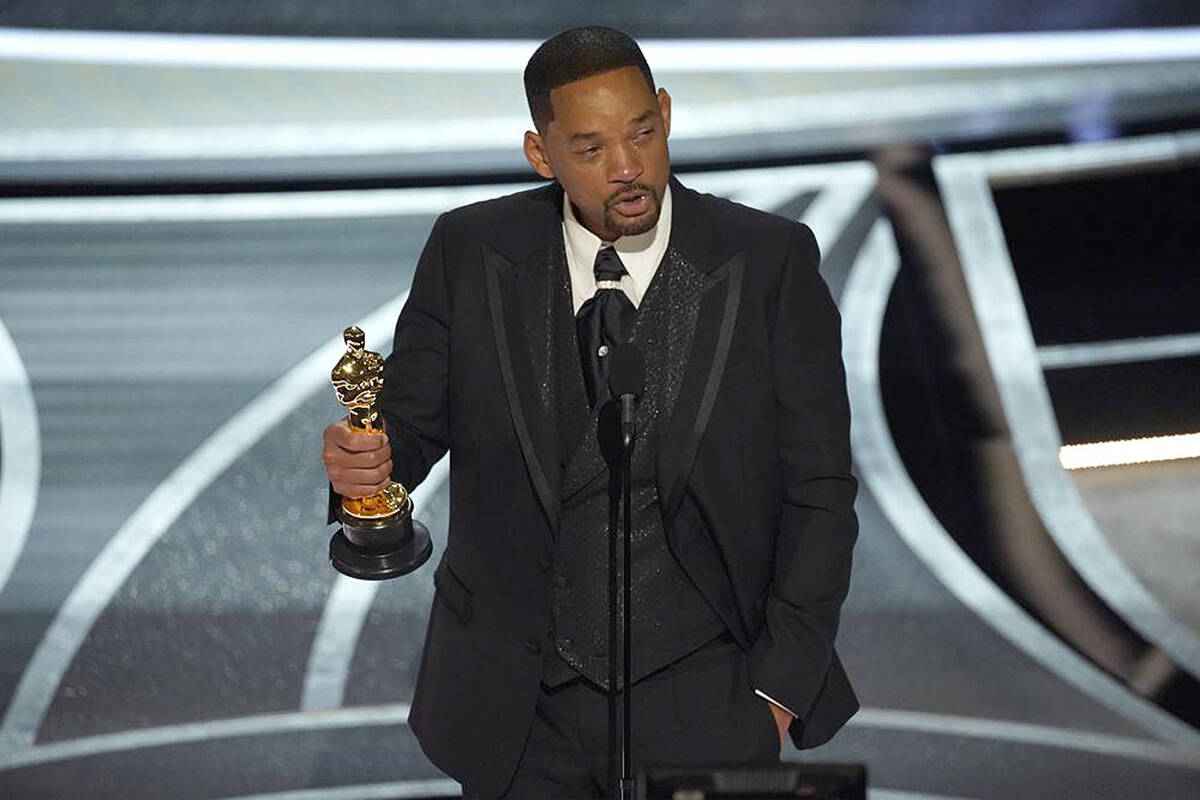 Will Smith cries as he accepts the award for best performance by an actor in a leading role for ‘King Richard’ at the Oscars on Sunday, March 27, 2022, at the Dolby Theatre in Los Angeles. (AP Photo/Chris Pizzello)