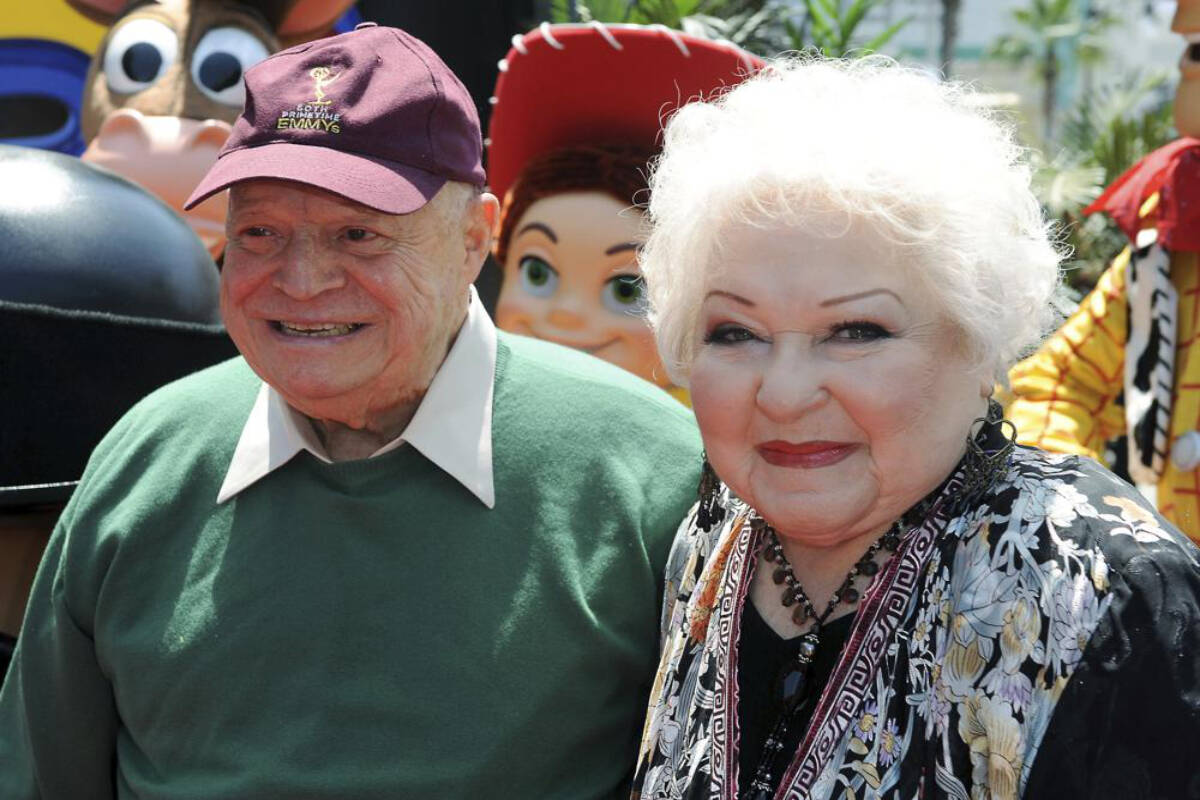 Estelle Harris, at right, and Don Rickles arrive at the world premiere of “Toy Story 3,” Sunday, June 13, 2010, at The El Capitan Theater in Los Angeles. Harris, who hollered her way into TV history as George Costanza’s short-fused mother on TV’s “Seinfeld” and voiced Mrs. Potato Head in the “Toy Story” franchise, has died. She was 93. Harris’ agent Michael Eisenstadt confirmed the actor’s death in Palm Desert, Calif., late Saturday, April 2, 2022. (AP Photo/Katy Winn, File)