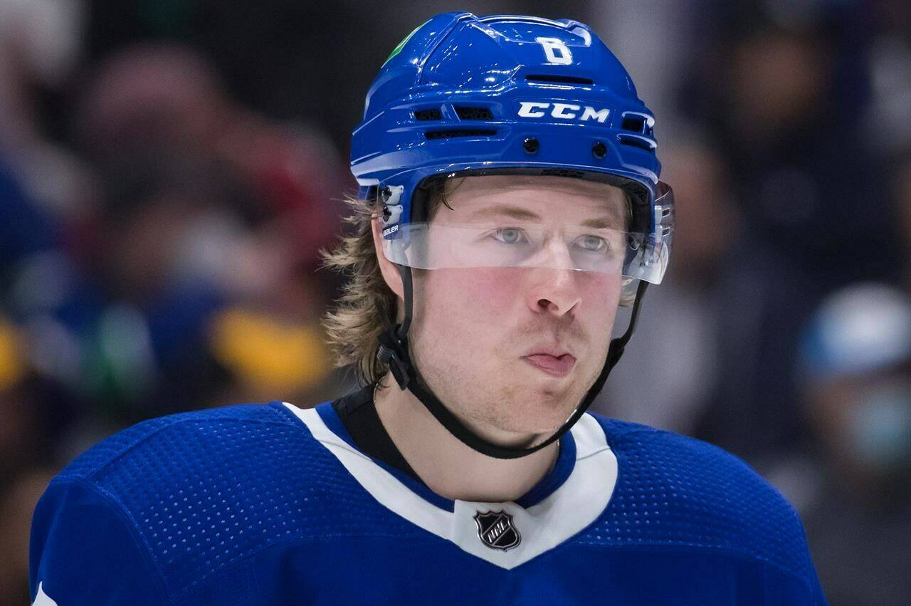 Vancouver Canucks’ Brock Boeser lines up for a faceoff against the Montreal Canadiens during the third period of an NHL hockey game in Vancouver, on Wednesday, March 9, 2022. THE CANADIAN PRESS/Darryl Dyck