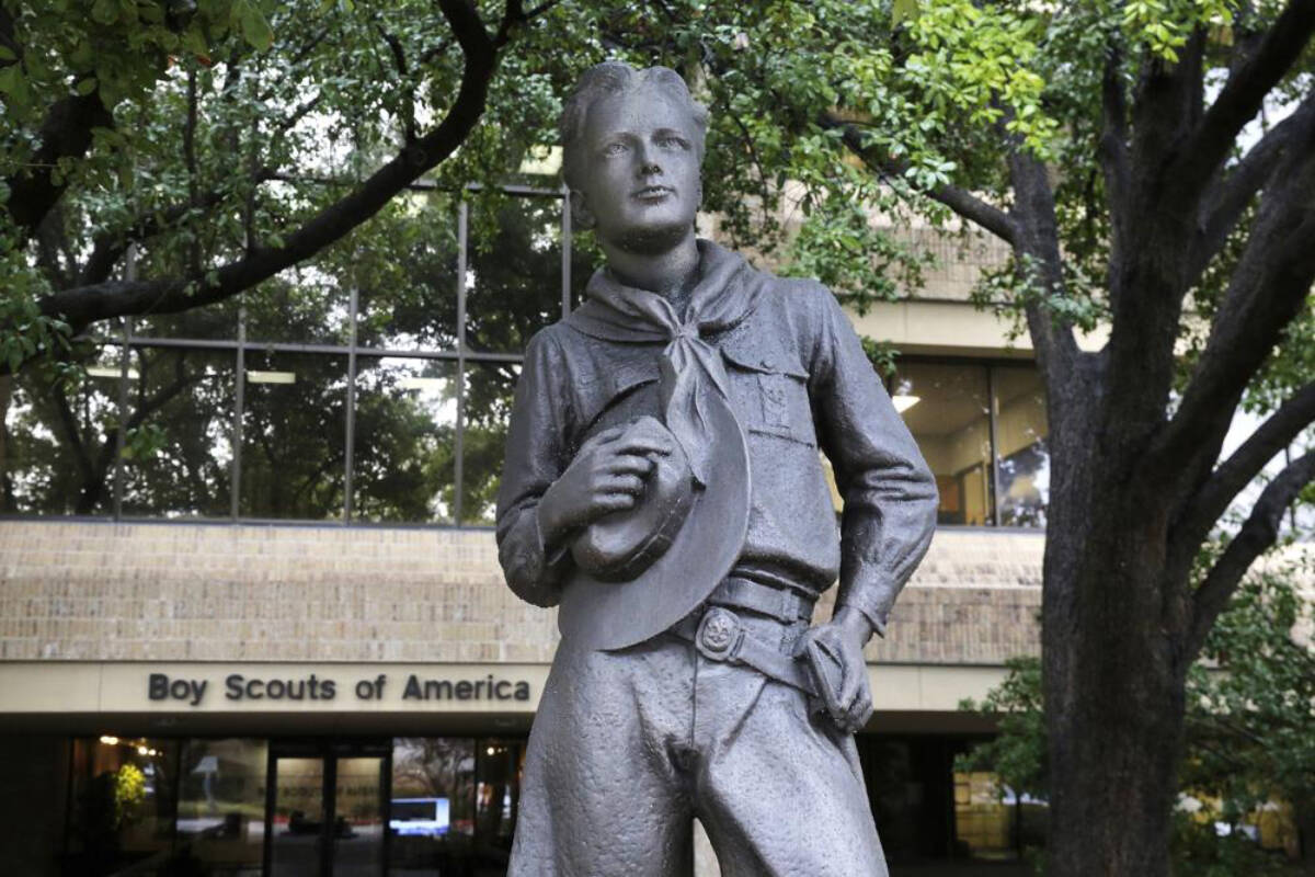 In this Feb. 12, 2020, file photo, a statue stands outside the Boy Scouts of America headquarters in Irving, Texas. (AP Photo/LM Otero, File)