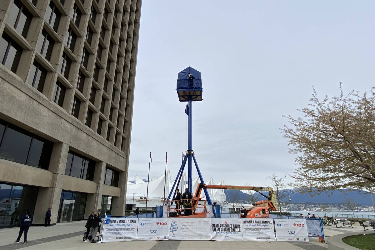 16-year-old Wilson Gaglardi is spending 100 hours in a tent atop a flagpole in downtown Vancouver to raise funds for diabetes research. (Cole Schisler/Black Press Media)