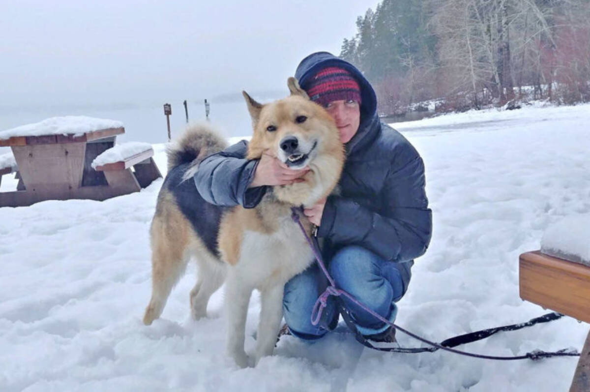 Shannon Boothman, pictured here with her beloved dog Itska in 2020, is believed to have died of hypothermia in Tofino early Sunday morning.