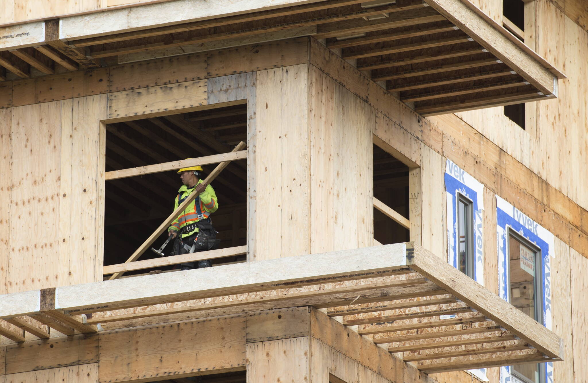 The Canada Mortgage and Housing Corp says the annual pace of construction on new homes picked up in July. A worker is seen working on a construction project at UBC in Vancouver, Tuesday, April 23, 2019. THE CANADIAN PRESS/Jonathan Hayward