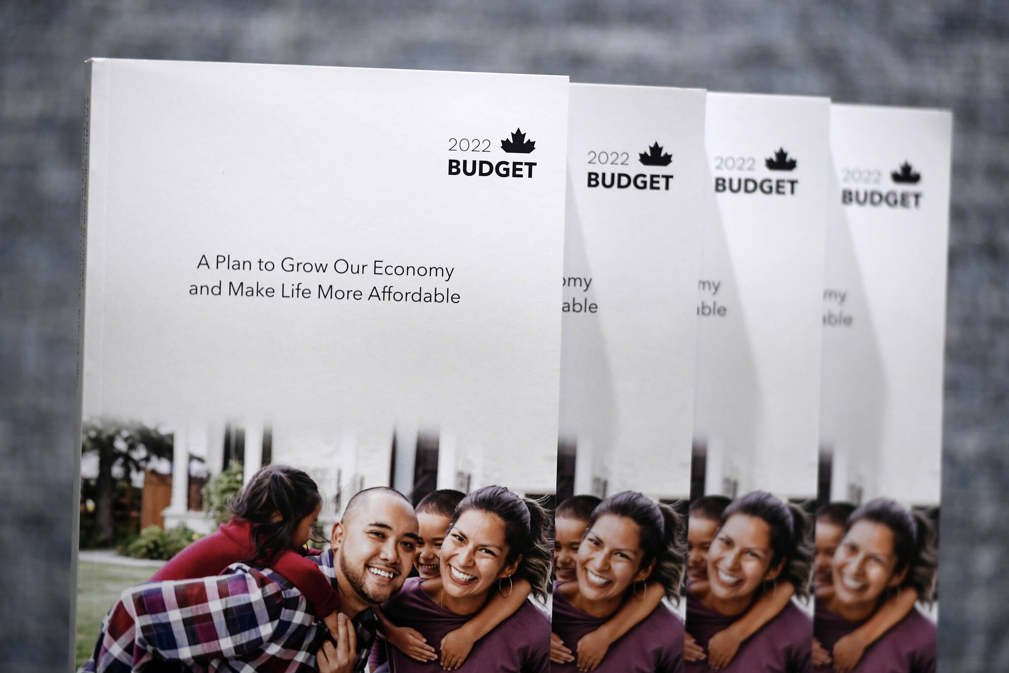 Copies of the 2022 federal budget are seen in the media lockup, ahead of the tabling of the federal budget, in Ottawa, on Thursday, April 7, 2022. THE CANADIAN PRESS/Justin Tang