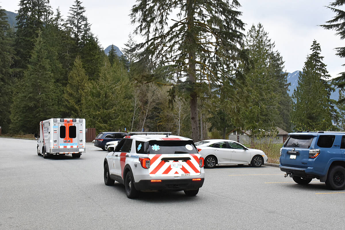 An ambulance leaves the scene at Alouette Lake where a plane crashed Thursday afternoon. (Neil Corbett/The News)
