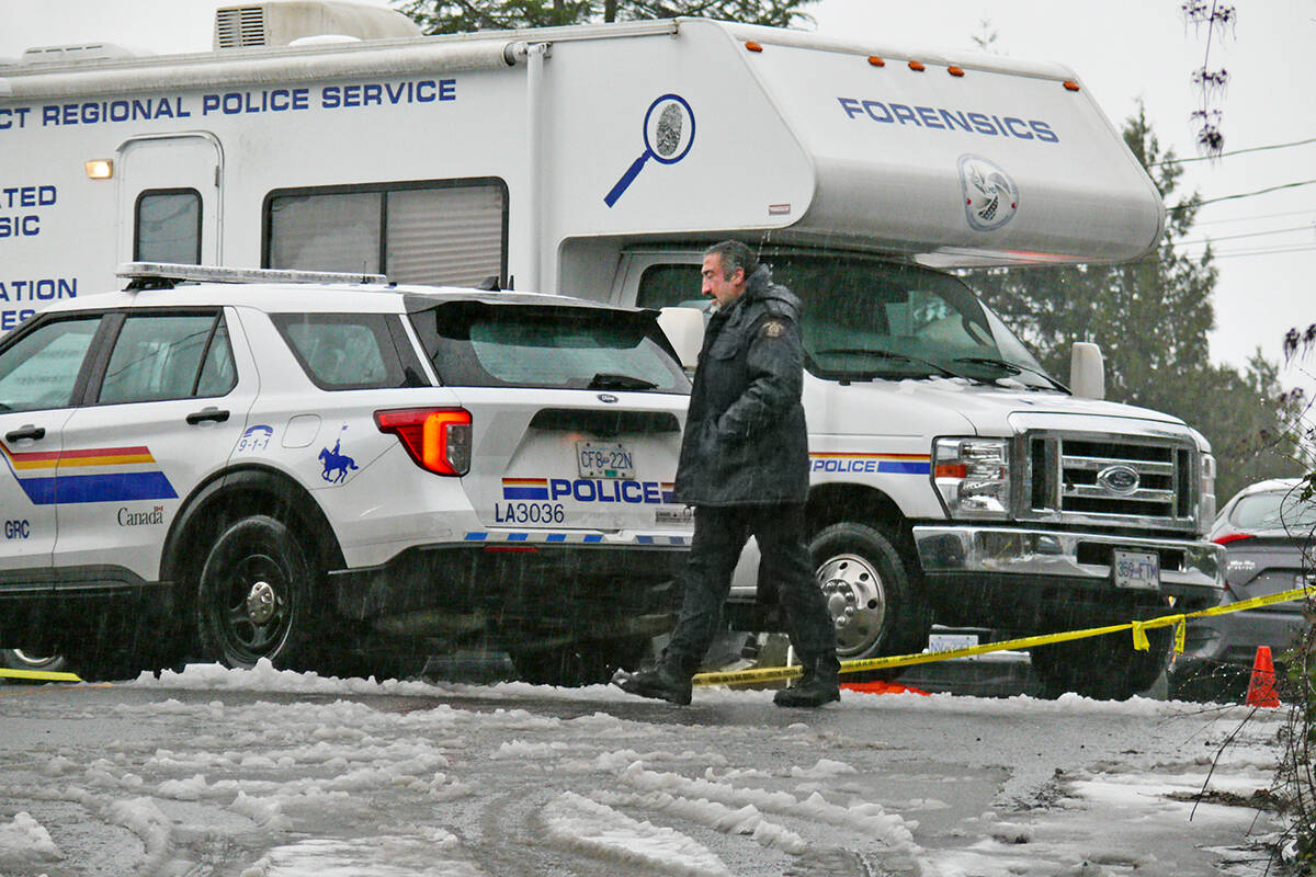 Forensic investigators returned to the home of Naomi Onotera after her husband was arrested and charged with her death on Dec. 17 last year. (Langley Advance Times files)
