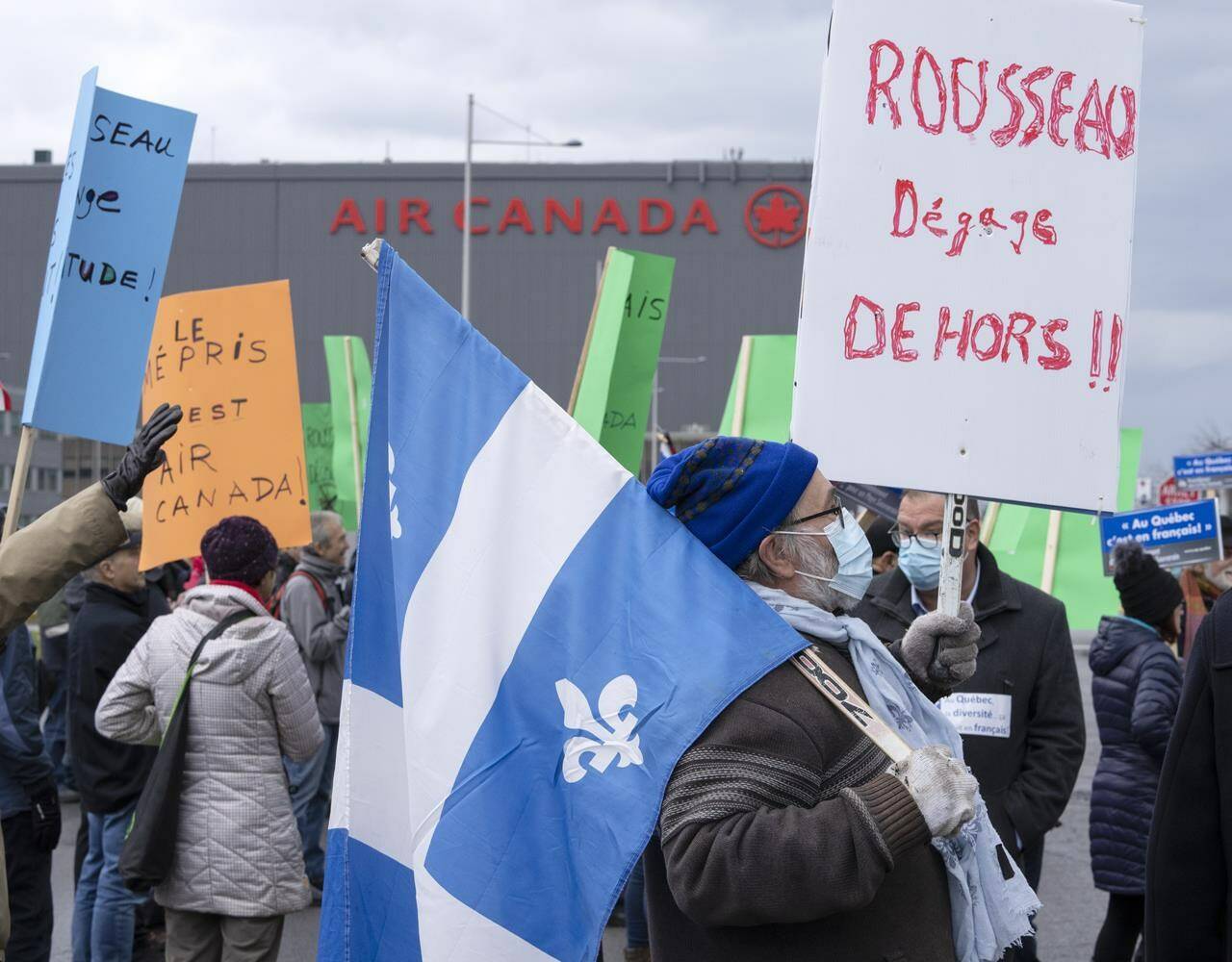 French language advocates protest Air Canada’s chief executive Michael Rousseau’s inability to speak French in front of the airline’s head office during a demonstration in Montreal, Saturday, Nov. 13, 2021. The Commissioner of Official Languages says a preliminary report into whether a speech by the chief executive of Air Canada in November met the airline’s obligations under the Official Languages Act has established that the complaints are founded. THE CANADIAN PRESS/Ryan Remiorz