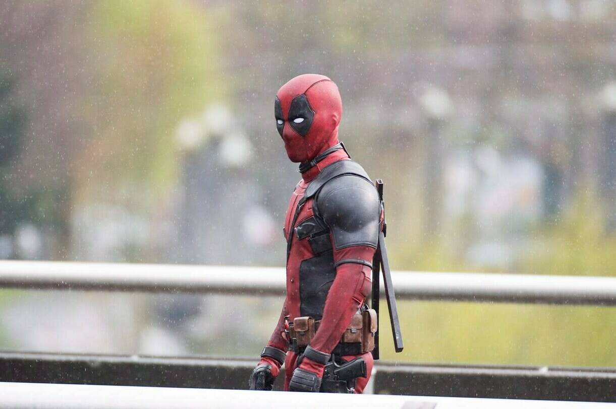 An actor believed to be Ryan Reynolds is dressed as Deadpool on a movie set in downtown Vancouver, B.C. Monday, April 13, 2015. What constitutes a Canadian film, TV program or “content” is at the heart of new legislation before Parliament that would require streaming services such as Netflix, Amazon Prime and Disney+ to feature a certain amount of Canadian content, similar to the obligations long placed on traditional broadcasters. THE CANADIAN PRESS/Jonathan Hayward