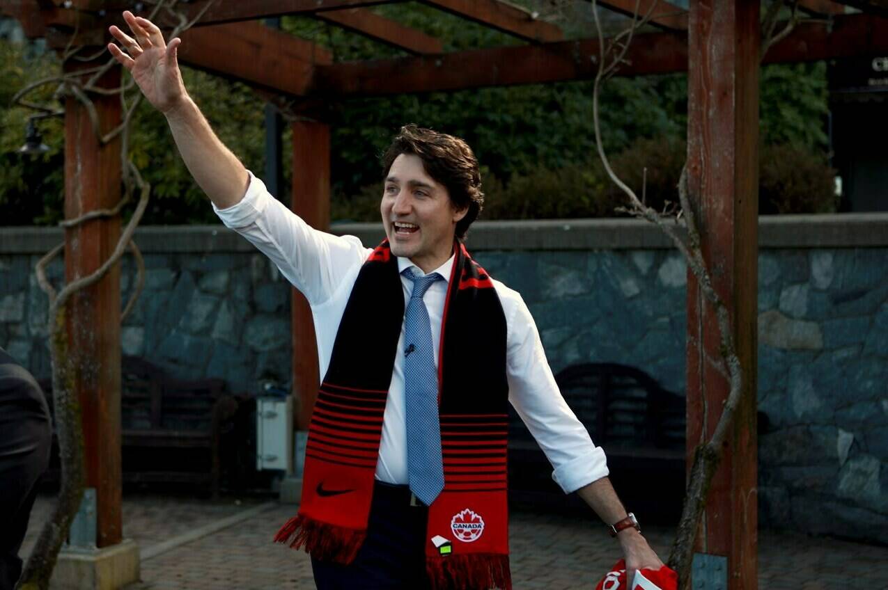 Prime Minister Justin Trudeau waves goodbye after stopping in for a surprise visit to the women's national soccer team warmup while at Bear Mountain Resort to wish them good luck before their game tonight in Langford, B.C., Monday, April 11, 2022. Trudeau will be in Edmonton today where he will attend events to promote his Liberal government's recent budget. THE CANADIAN PRESS/Chad Hipolito