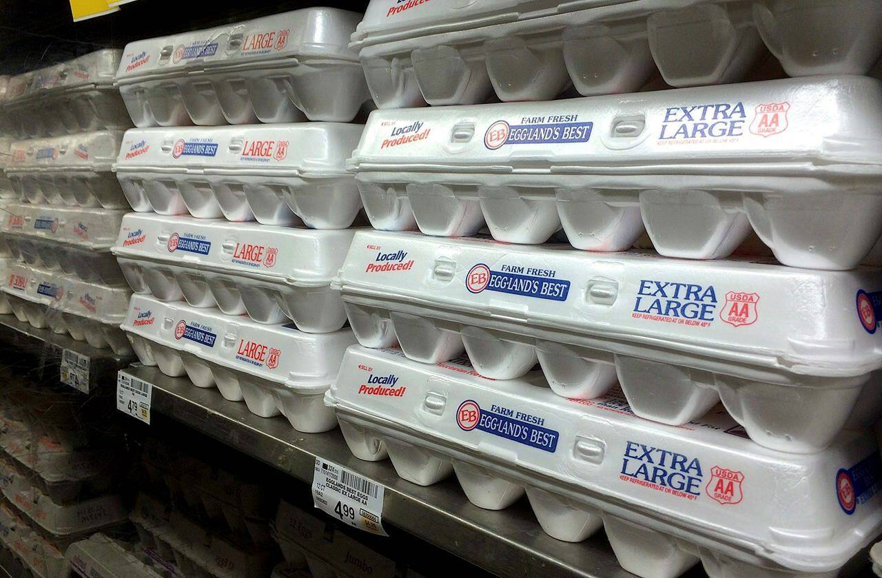 This July 6, 2016, file photo shows egg cartons displayed on a shelf at a market in San Francisco. Agriculture and Agri-Food Canada says the food industry is making adjustments to maintain supplies of poultry and eggs in the face of a large outbreak of avian flu in Canada and around the world.THE CANADIAN PRESS/AP/Jeff Chiu, File