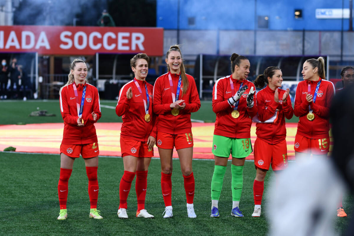 Members of the team during pre-game ceremony, held to recognize the gold-medal winning team, at Starlight Stadium on April 11. (Sheldon Mack/Pacific FC)