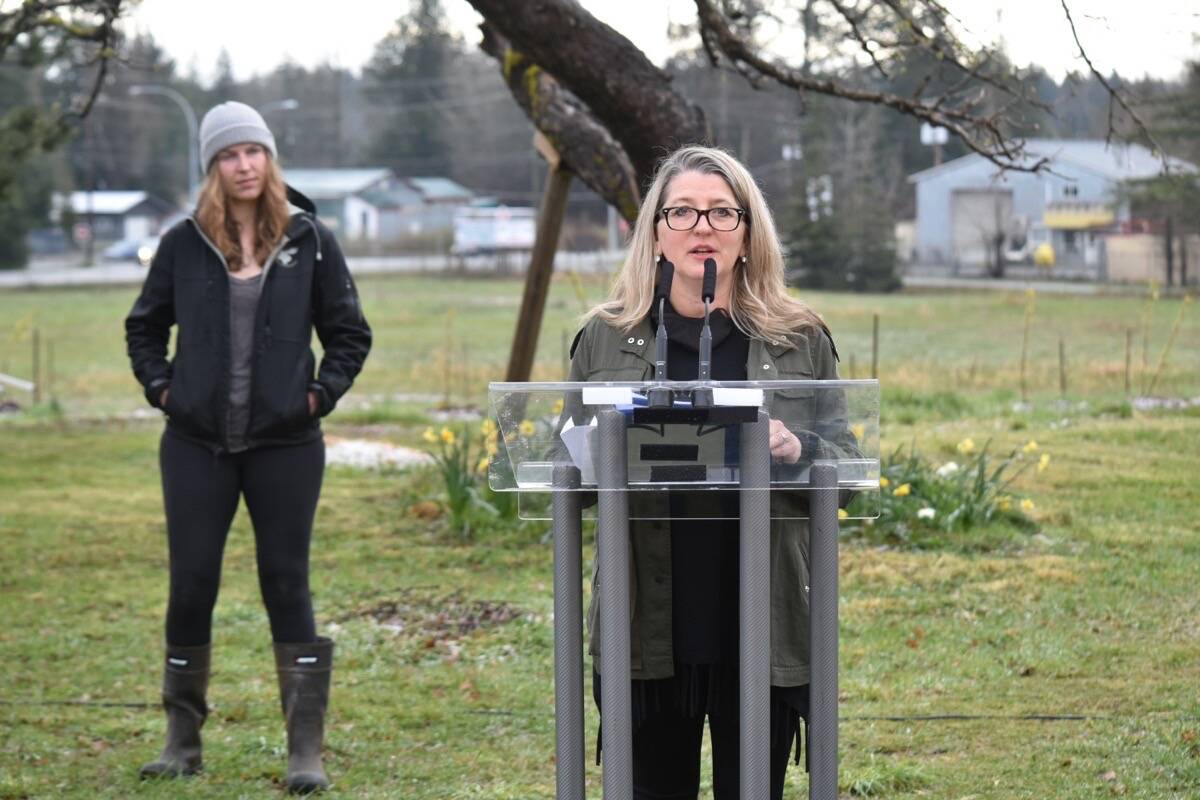 B.C. Agriculture Minister Lana Popham introduces Sarah Wilson of Pendleton Farm in the Comox Valley, one of more than 200 farmers using the B.C. Land Matching Program, Merville, April 13, 2022. (Scott Stanfield/Comox Valley Record)