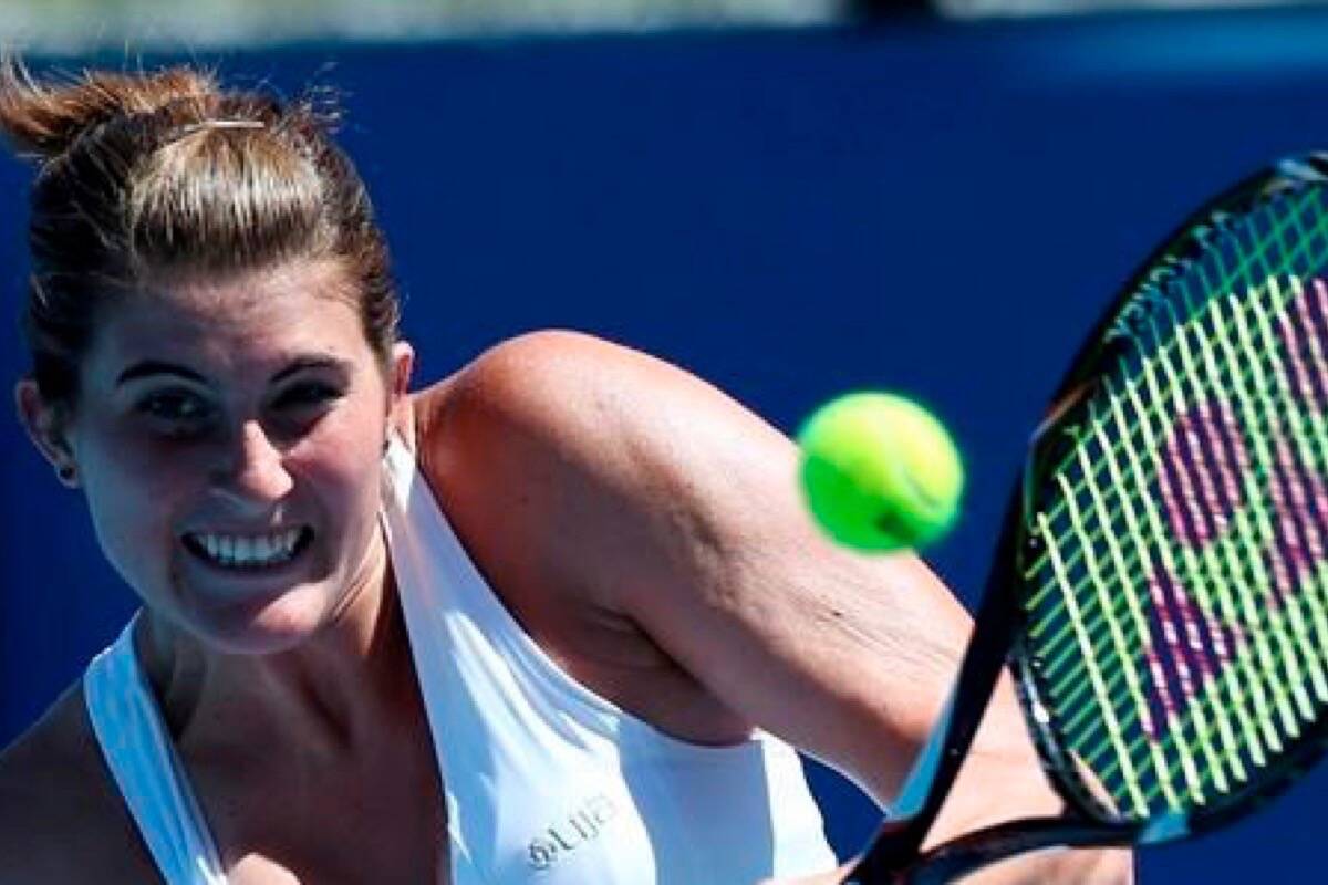 In this Jan. 15, 2013, file photo, Canada’s Rebecca Marino hits a backhand return to China’s Peng Shuai during their first round match at the Australian Open tennis championship in Melbourne, Australia. (File photo by THE ASSOCIATED PRESS)