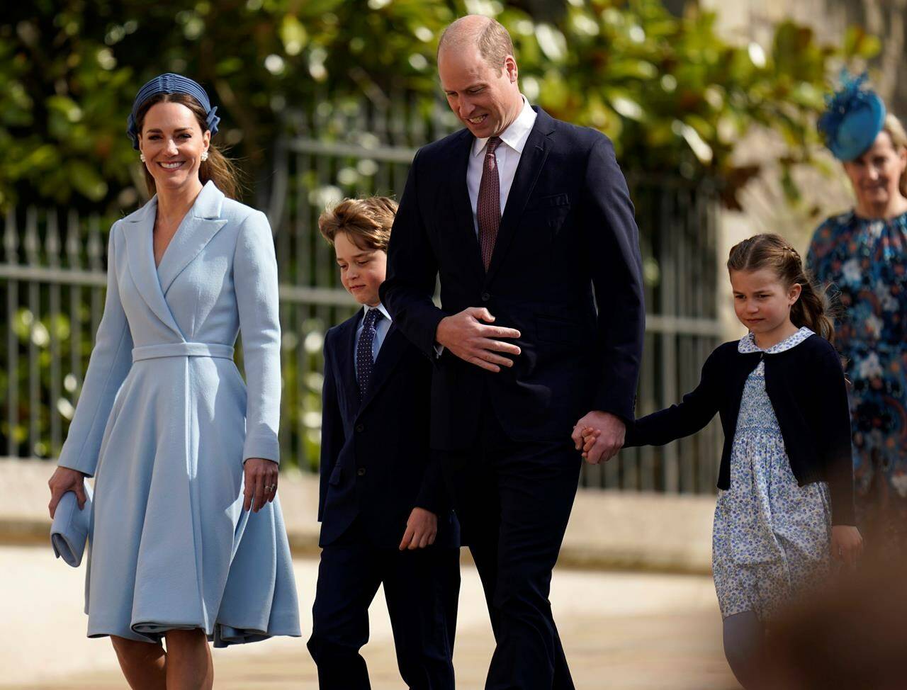 Britain’s Prince William and Kate, Duchess of Cambridge arrive with Prince George and Princess Charlotte to the Easter Mattins Service at St George’s Chapel at Windsor Castle in Berkshire, England, Sunday, April 17, 2022. (Andrew Matthews/Pool Photo via AP)