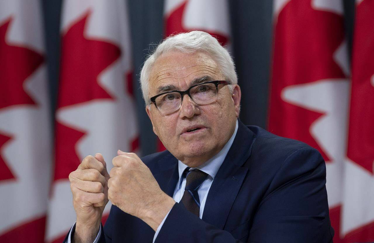 Official Languages Commissioner Raymond Theberge responds to a question during a news conference in Ottawa on May 9, 2019. Theberge says events broadcast live on Prime Minister Justin Trudeau’s Facebook page must be accessible in both English and French. THE CANADIAN PRESS/Adrian Wyld