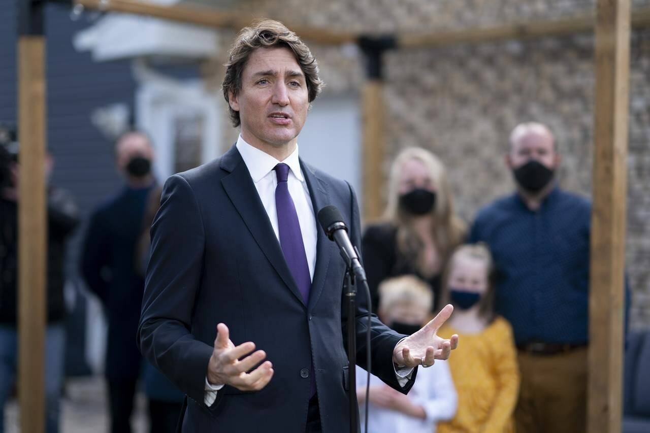 Prime Minister Justin Trudeau speaks about housing after meeting privately with two families in Kitchener, Ont. on Wednesday, April 20, 2022. THE CANADIAN PRESS/Peter Power