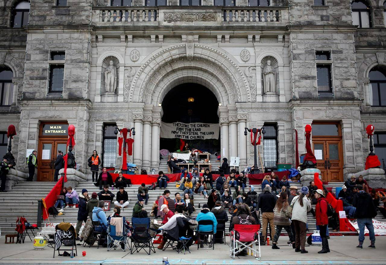 Wet’suwet’en supporters and Coastal GasLink opponents continue to protest outside the B.C. Legislature in Victoria, B.C., on Thursday, February 27, 2020. THE CANADIAN PRESS/Chad Hipolito