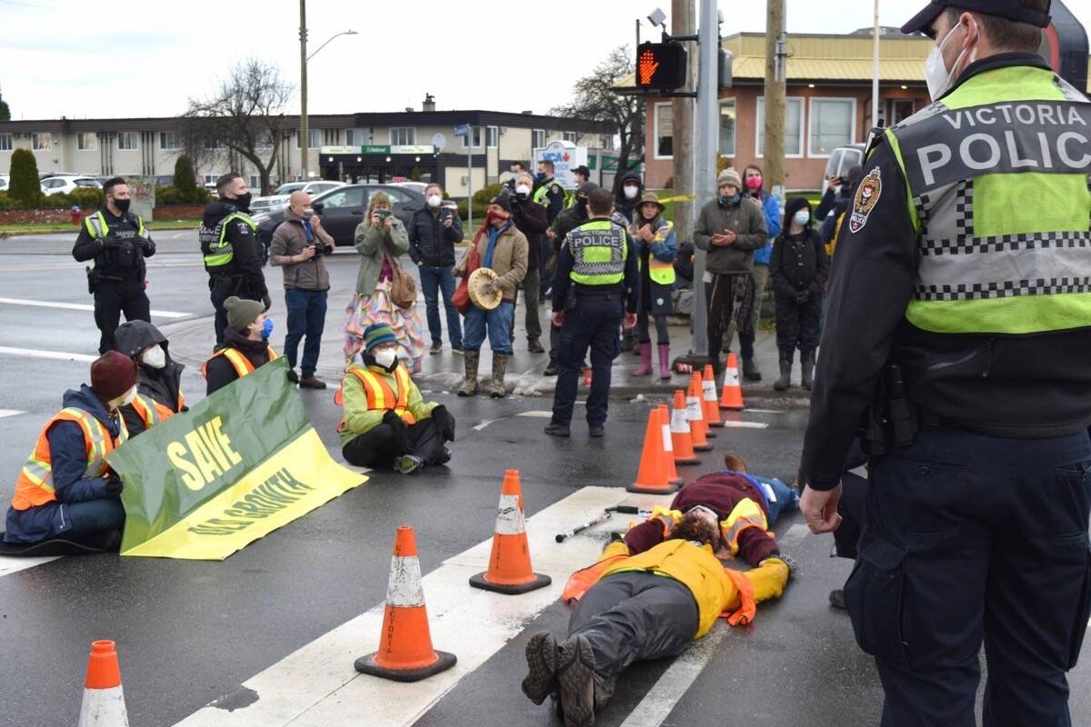 “Save Old Growth” protesters block Monday morning commuter traffic at Burnside Road and Douglas Street in Victoria, Jan. 10, 2022. Similar blockades were set up in the Lower Mainland this week. (Victoria News photo)