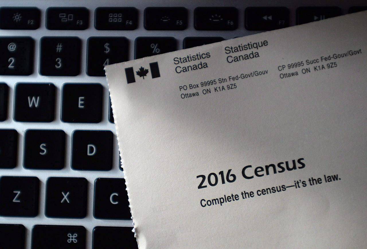 A Statistics Canada 2016 Census mailer sits on the key board of a laptop after arriving in the mail at a residence, in Ottawa in a May 2, 2016, file photo. By the time the 2016 census rolled around, the ranks of Canada’s seniors over age 65 had for the first time outnumbered the nation’s youth 14 years of age and younger. THE CANADIAN PRESS/Sean Kilpatrick