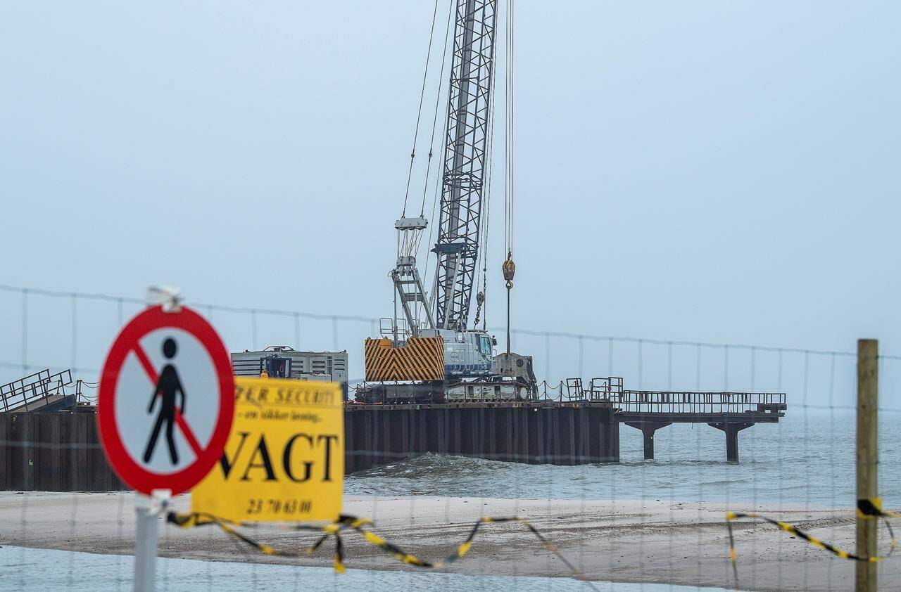 FILE - Construction work on a 200 meter long pier being built where the gas pipeline is due to come ashore at Houstrup Strand, in West Jutland, Denmark, Tuesday Feb. 23, 2021. Russia has opened a new front in its war over Ukraine, cutting two European Union nations that staunchly back Kyiv off from its gas. That represents a dramatic escalation in a conflict that is increasingly becoming a wider battle with the West. (John Randeris /Ritzau Scanpix via AP, File)